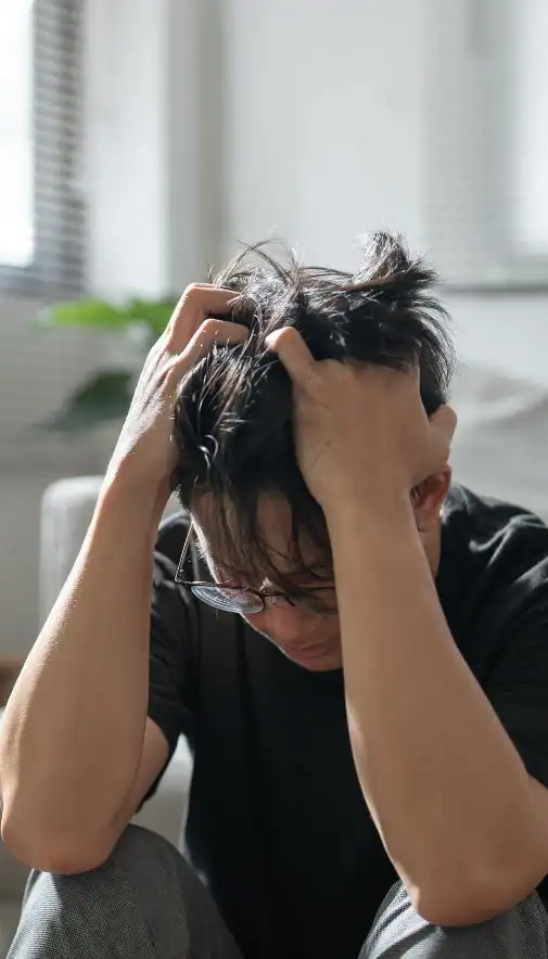 Image of upset man because of erectile dysfunction symptoms Chelmsford