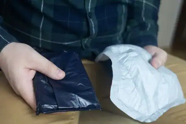 image of man holding stool incontinence Chelmsford products